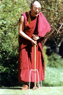The Dalai Lama, the Tibetan spirtual leader playing croquet at the Egerton Grey Hotel