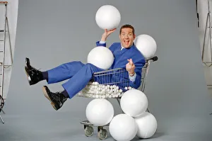 Dale Winton, TV presenter, poses for a studio photoshoot to celebrate his hosting of