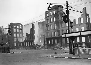 Damage to a bus station and surrounding buildings after an air raid in Manchester