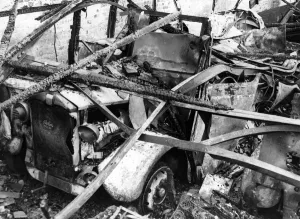 01435 Prints: A damaged Albion motor car in South Wales following an attack by Nazi raiders. Circa 1941