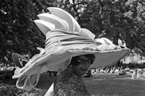 Ascot Prints: Dame Edna Everage (aka Barry Humphries) trying on her new hat for Ascot