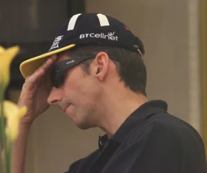 01372 Prints: Damon Hill ponders his future over lunch July 1999 in the Jordan motor home
