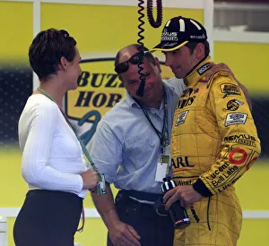 01372 Prints: Damon Hill and wife Georgie July 1999 at the end of the 1999 British Grand Prix
