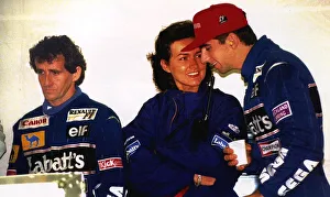 Damon Hill with his wife Georgie in the Williams pits on the left is Alain Prost