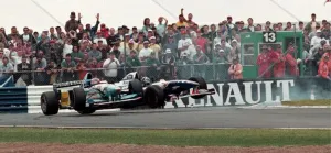 1995 Prints: Damon Hill in a Williams and Michael Schumacher in a Beneton collide in the British Grand