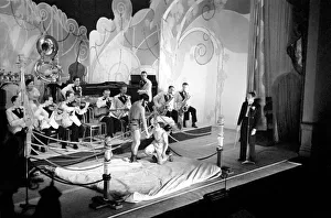 Dance band leader and trumpeter Jack Jackson with his band performing on stage in