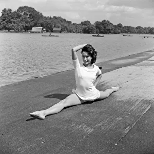 Ballerina Prints: Dancer Gillian Lynne has her own idea of a sitting position whilst taking the sun