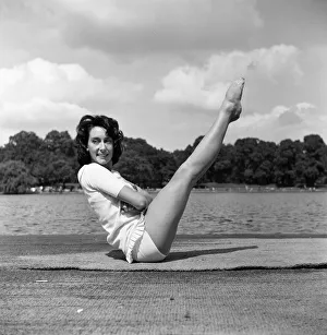 01269 Prints: Dancer Gillian Lynne has her own idea of a sitting position whilst taking the sun