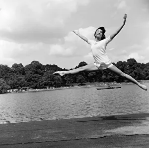 Dancer Gillian Lynne has her own idea of a sitting position whilst taking the sun