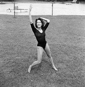 Dancer Gillian Lynne has her own idea of a sitting position whilst taking the sun