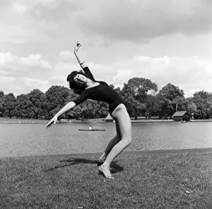 Dancer Gillian Lynne has her own idea of a sitting position whilst taking the sun