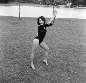 Dancer Gillian Lynne has her own idea of a sitting position whilst taking the sun