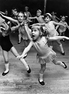 00036 Prints: Dancing Children: 4-years-old Claire Tait from Dalston leaps into a ballet pose