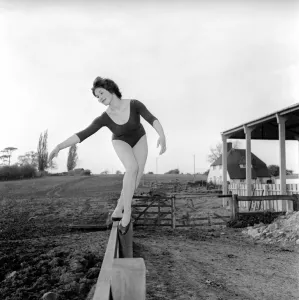 Dancing on the farm Ballerina Gillian Brodie seen here performing on fence posts