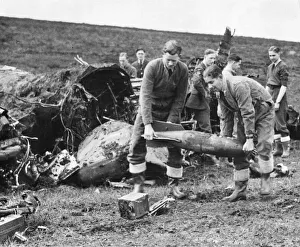 01442 Prints: Dangerous task for some of the RAF (Royal Air Force) crash experts unloading the bombs