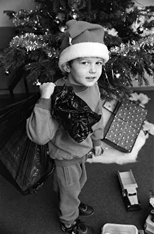 Daniel Bell came into the office with a sack of toys for the Examiner Christmas Toy