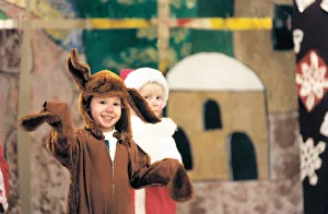 00519 Prints: Daniel Holmes is Rudolph and Stephen Davies Santa at St Alberts School