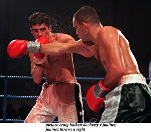 Daniel Jiminez of Puerto Rico and Drew Docherty of Scotland in action during their WBO