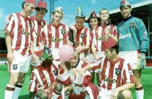 Dave Bassett and the players of Sheffield United seen here celebrating an early