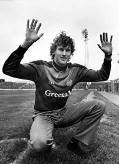 Strip Prints: Dave Beasant tries on the United keepers jersey at St Jamess yesterday