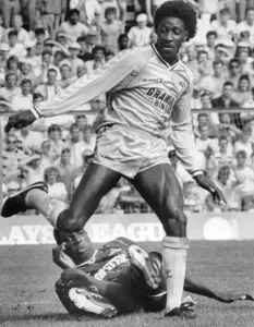 Dave Bennett goes on the attack and leaves Spurs defender Mitchell Thomas grounded
