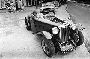 Dave Harris, 32, and his 1947 MG TC which he will be driving to Le Mans to see the famous