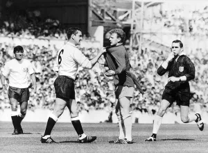 Dave Mackay Grabs Billy Bremner of Leeds by his shirt in 1966 match Against Tottenham