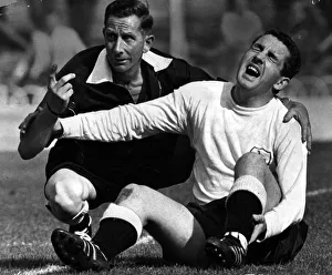 Dave Mackay Spurs football player September 1964 Lie on ground with broken leg