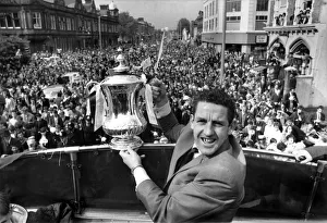 Open Top Prints: Dave Mackay of Tottenham Hotspur parades the FA Cup down the High Street in Tottenham