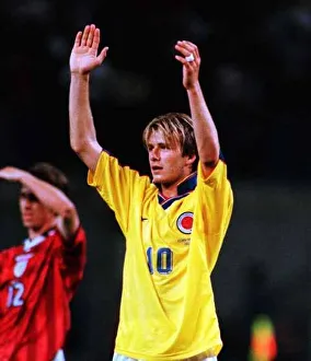 David Beckham arms aloft wearing Colombian shirt Jun 98 after Englands