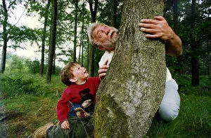 Images Dated 3rd July 1994: David Bellamy teaches Mark Cumberledge, aged 2, from Hookergate, about Chopwell Woods