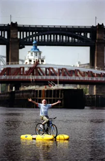 Animated Prints: David Bellamy tries out the shuttle bike to cross the River Tyne in Newcastle on 11th May