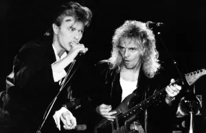 David Bowie playing a secret concert in a tiny old time music hall before 150 people