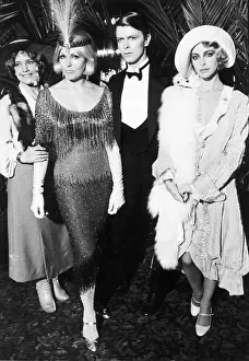 Granduer Prints: David Bowie rock star, singer and actor surrounded by the three leading lady stars in