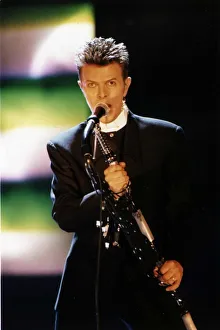 David Bowie Singer Songwriter at the Brit Awards 96 Wearing black suit singing