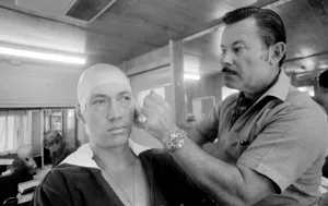 Dressing Room Prints: David Carradine actor has his makeup applied on set of TV programme Kung Fu (1972-1975)