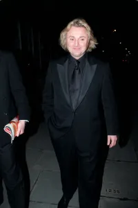 David Emmanuel Designer March 98 Arriving at the royal albert hall to hear