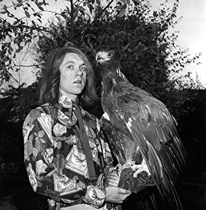 Eagle Prints: David Fox seen here taking his pet Golden Eagle for a walk around the local neighbourhood