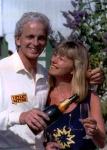 1995 Prints: David Gower former cricket player for Hampshire CCC pours a glass of Champagne for his