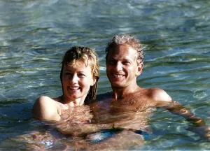 00479 Prints: David Gower cricketer with Thorrun Nash in the sea during their visit to the West Indies