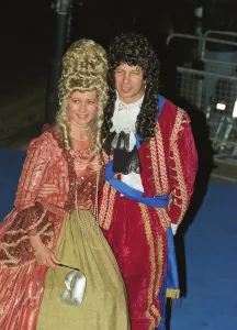 David Gower former England Cricketer with his wife Thorunn dressed in period costume