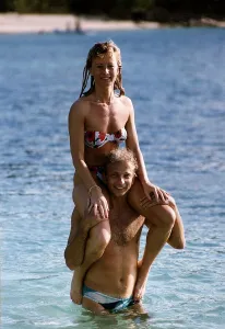 David Gower the former English Cricket player of Hampshire CCC carries his girlfriend