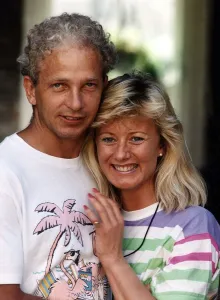 David Gower ex England Cricket player hugs Thorrun Nash the half Icelandic lady who he