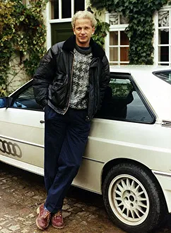 David Gower ex England Player standing beside white Audi Quatro dbase