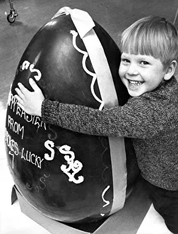 00083 Prints: David Hall receives a giant Easter egg from the staff and players at Ladbrokes Bingo