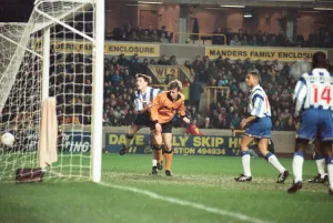 David Kelly scores against Sheffield Wednesday in the FA Cup to put Wolves one up