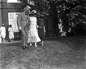 Carrying Prints: David Lloyd George, ex Prime Minister at Lady Crossfields garden party
