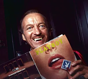 Magazine Prints: David Niven as Dracula, reading the Playboy magazine Circa 1979