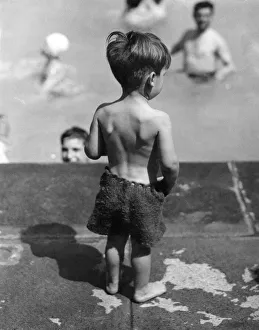 Loneliness Prints: David Snowdon age 1 seen here at a West London Lido wearing woolen swimming trunks