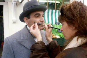 Screen Prints: David Suchet Actor has his moustache adjusted while on the set of the TV programme Poirot